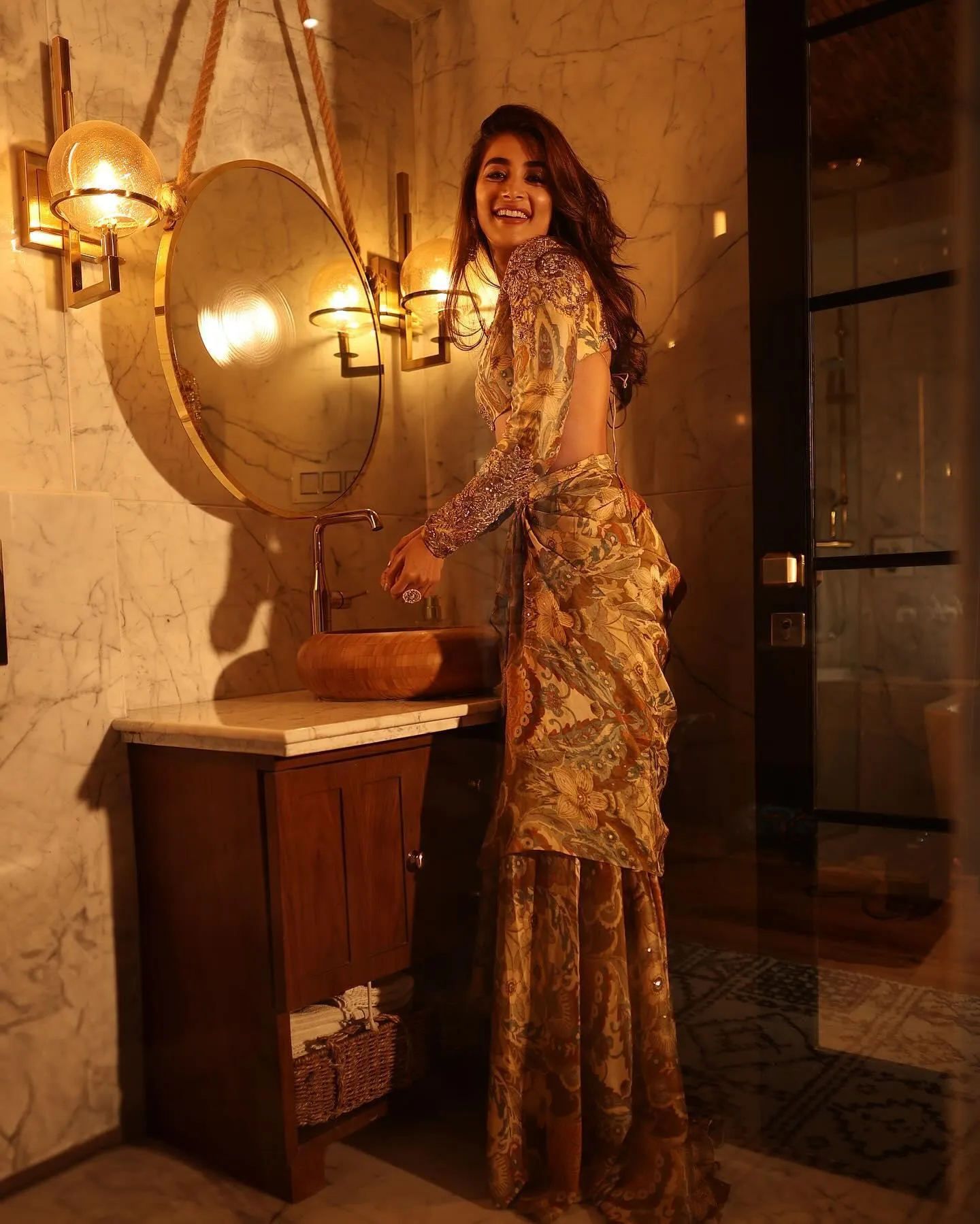Glamorous Pooja Hegde in a Golden Designer Saree Wallpaper