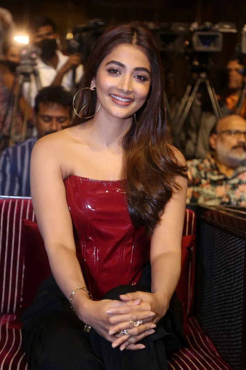 Glamorous Pooja Hegde in Red and Black At Night Event