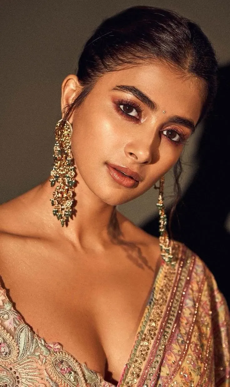 Glamorous Pooja Hegde Wearing Large Earrings and Dress