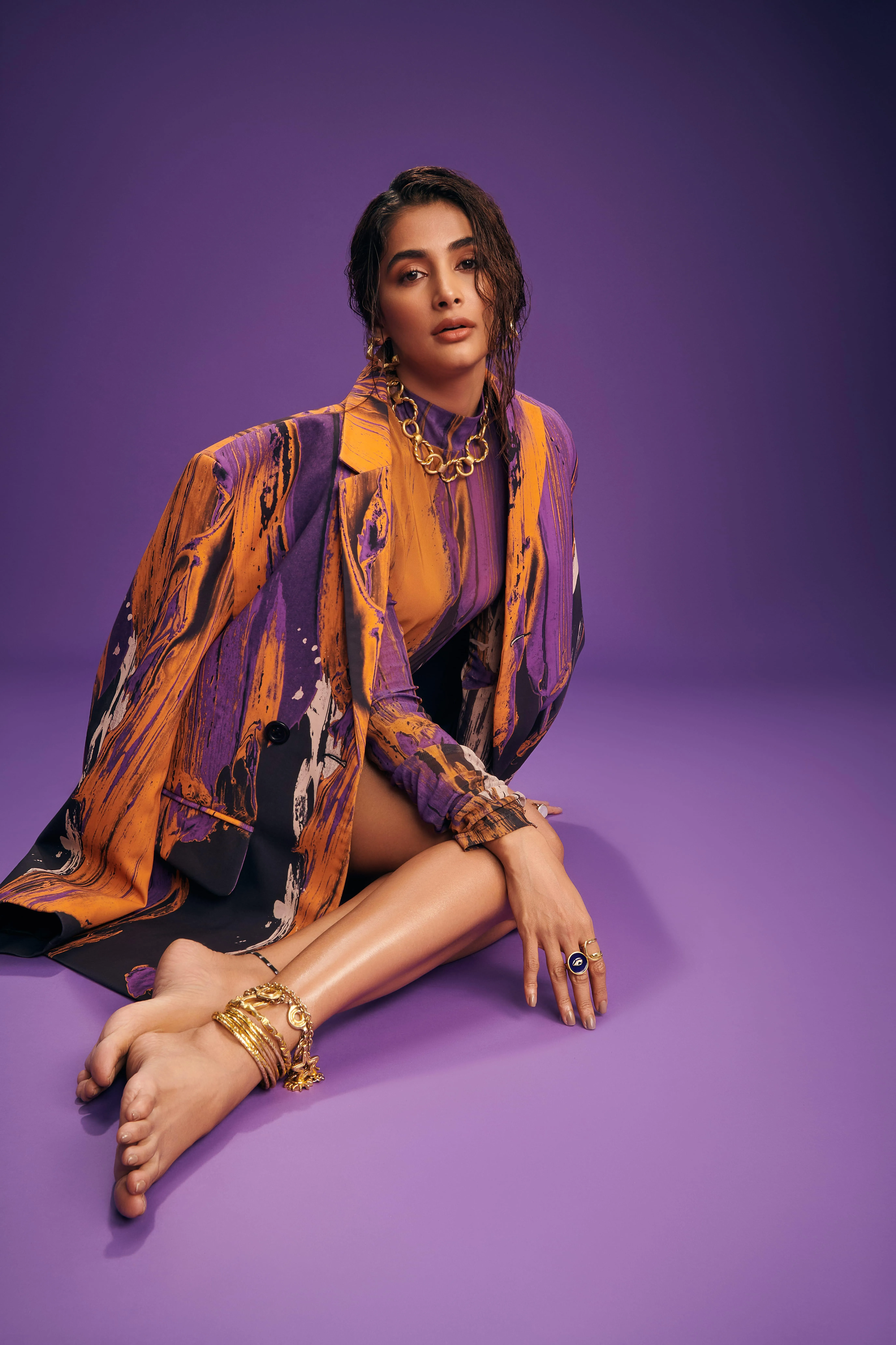 High Fashion Pose of Pooja Hegde in Purple Studio Setting