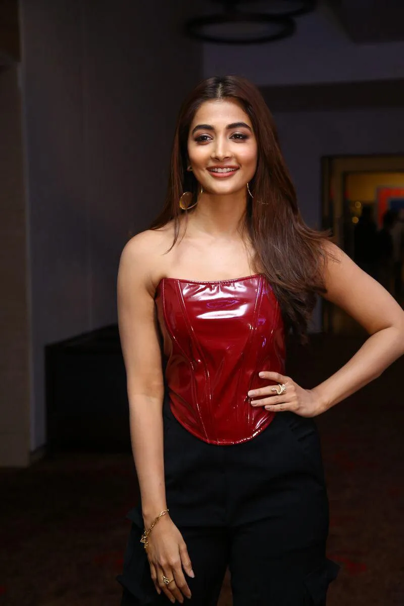Modern and Stylish Pooja Hegde in Glossy Red and Black Outfit