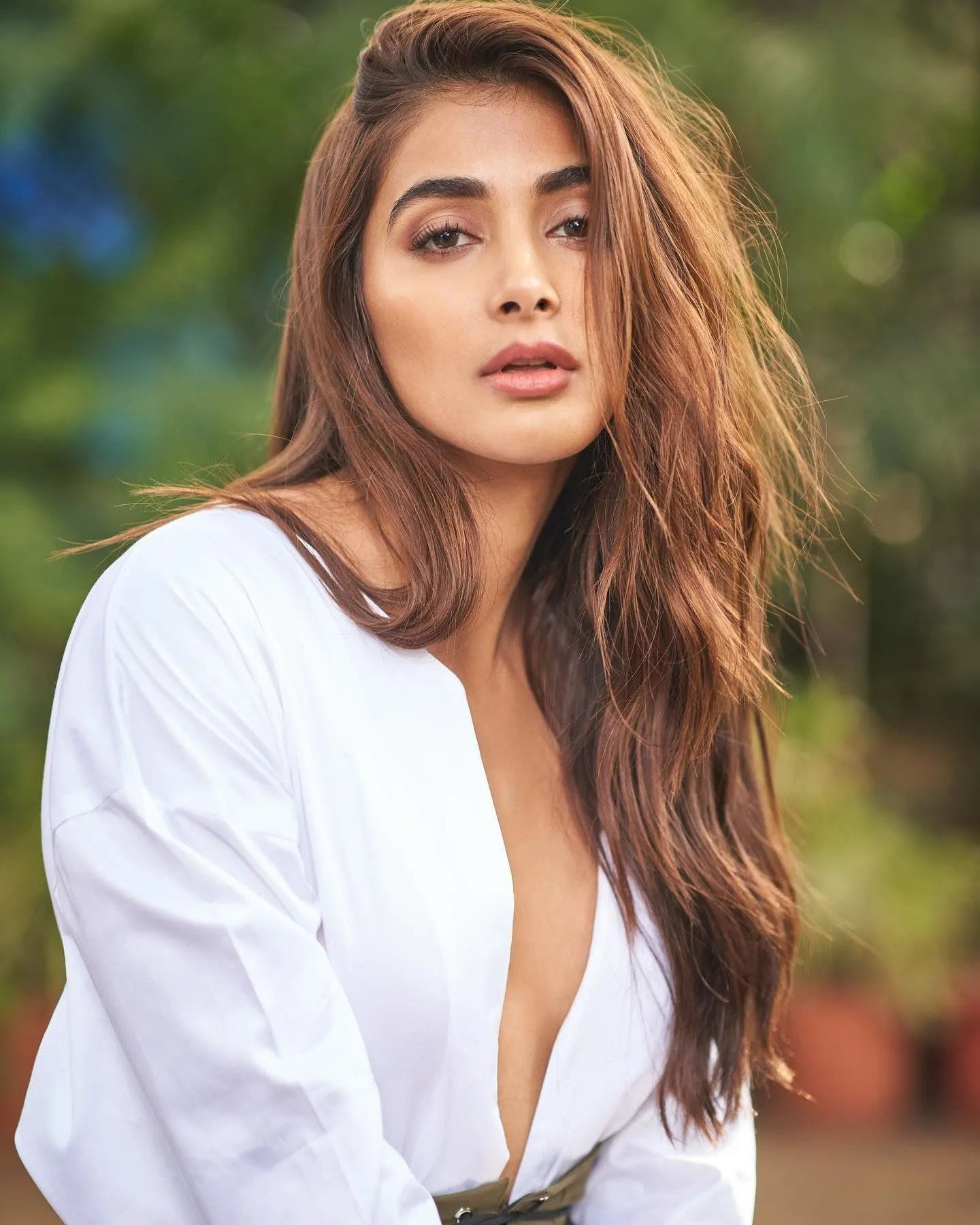 Natural Pooja Hegde Look in White Deep Neck Shirt Wallpaper
