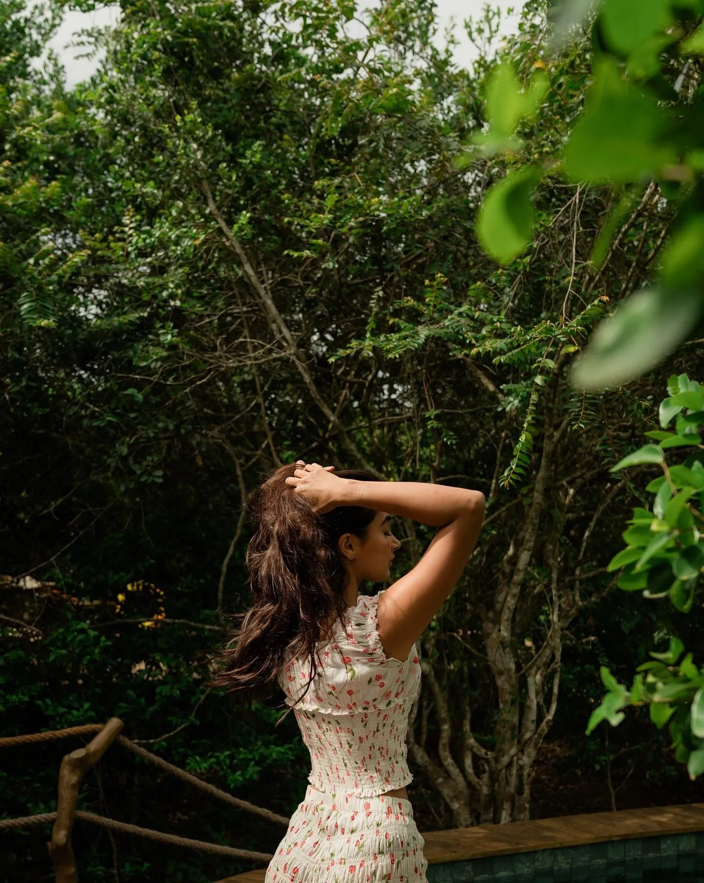Pooja Hegde Admires Nature in a Sleeveless Printed Dress