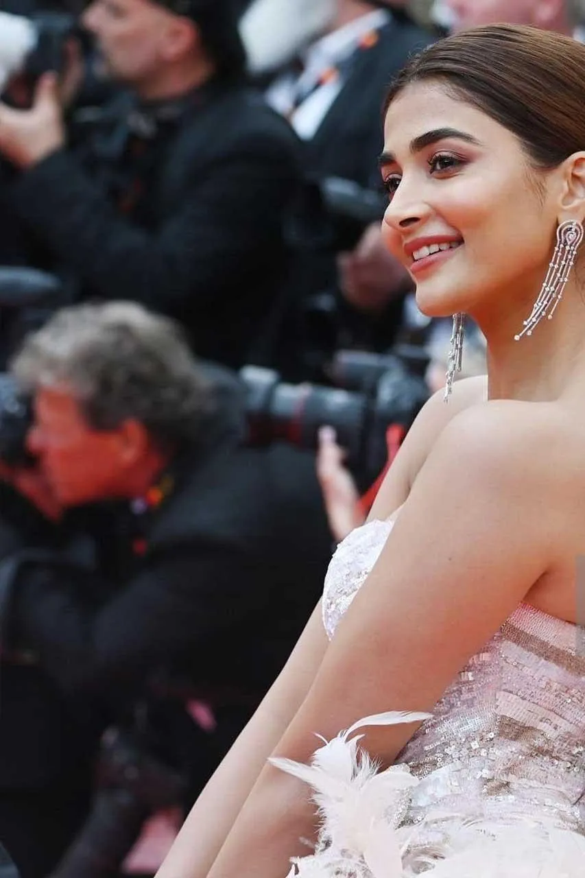 Pooja Hegde At Event in Pink Gown with Elegant Smile
