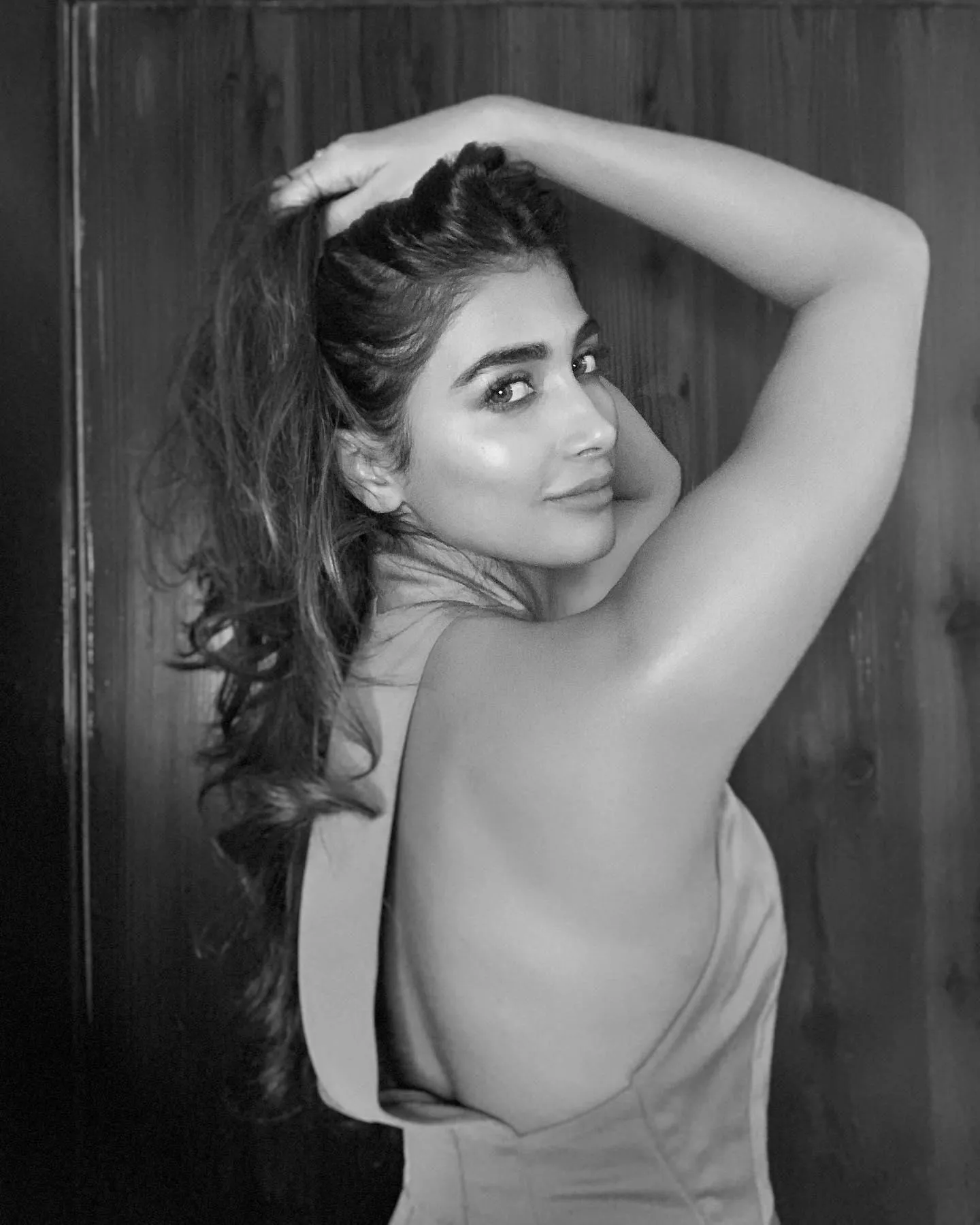Pooja Hegde Black and White Photo with Hand in Hair Pose