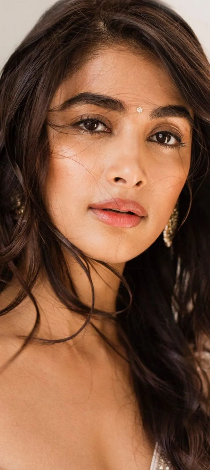 Pooja Hegde Closeup with Wavy Hair and Natural Makeup