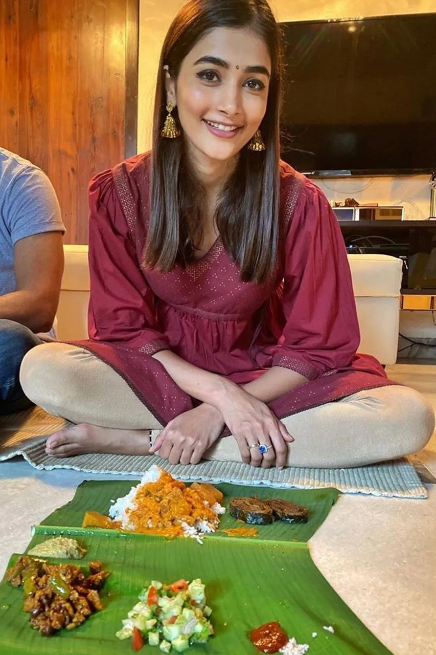 Pooja Hegde Enjoying a Traditional Meal on Banana Leaf