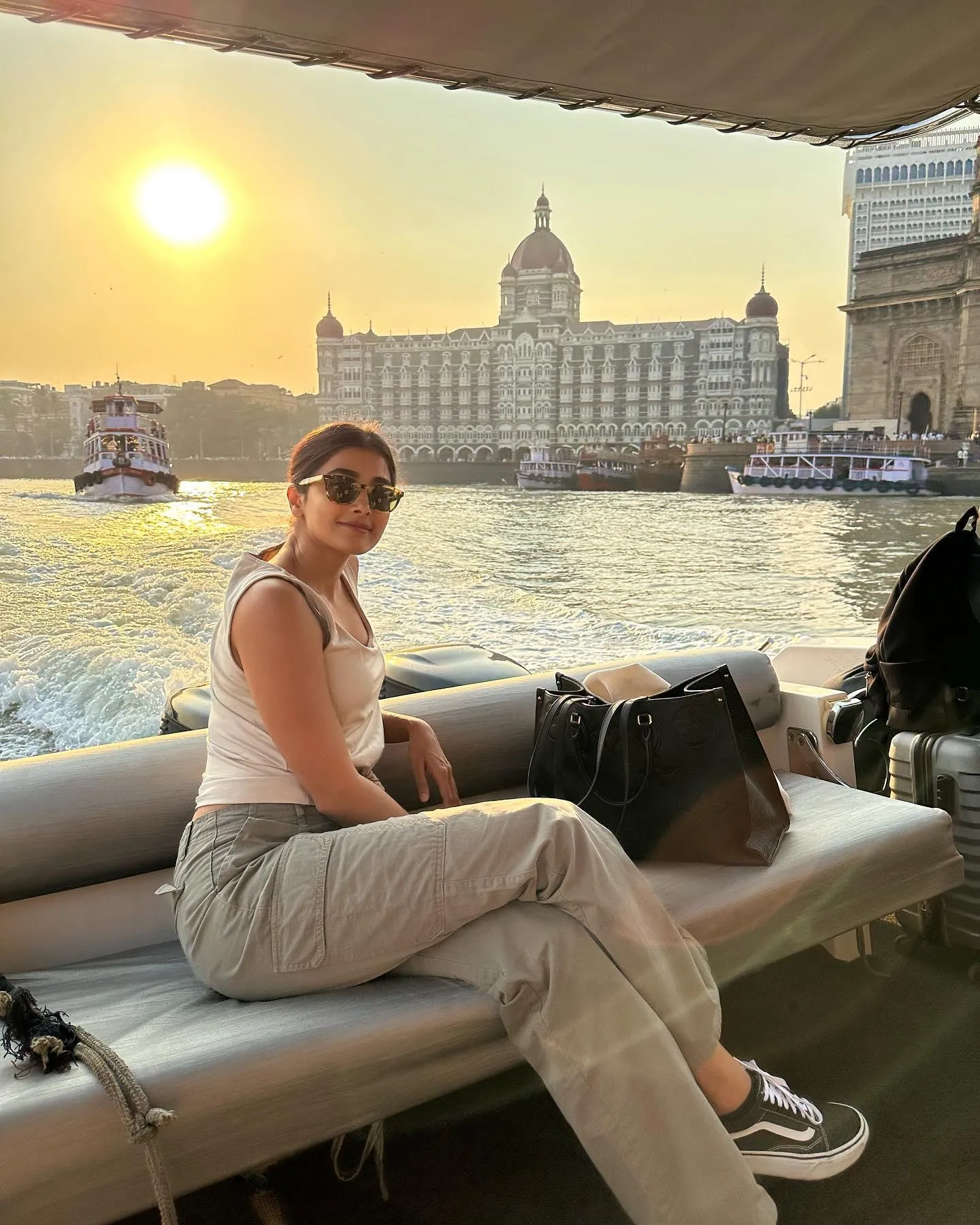 Pooja Hegde Enjoying Boat Ride with Scenic Sunset Backdrop