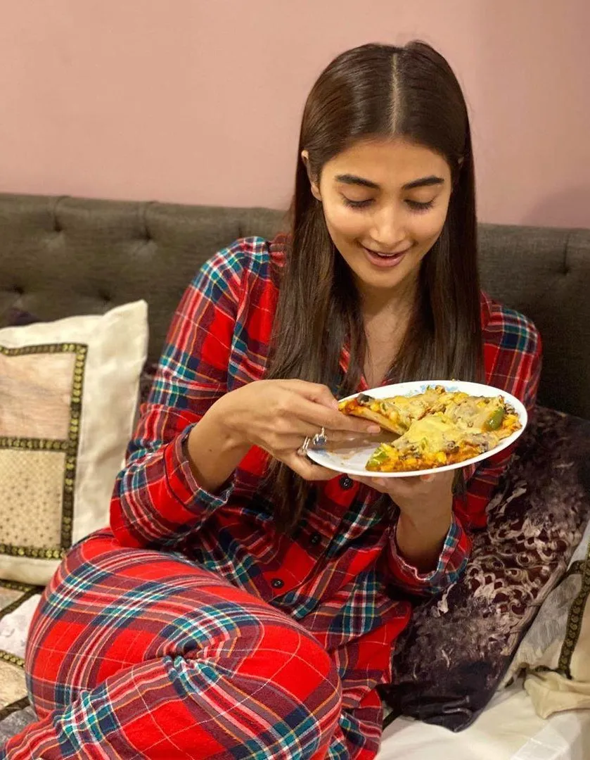 Pooja Hegde Enjoying Food in Cozy Pajamas At Home Image