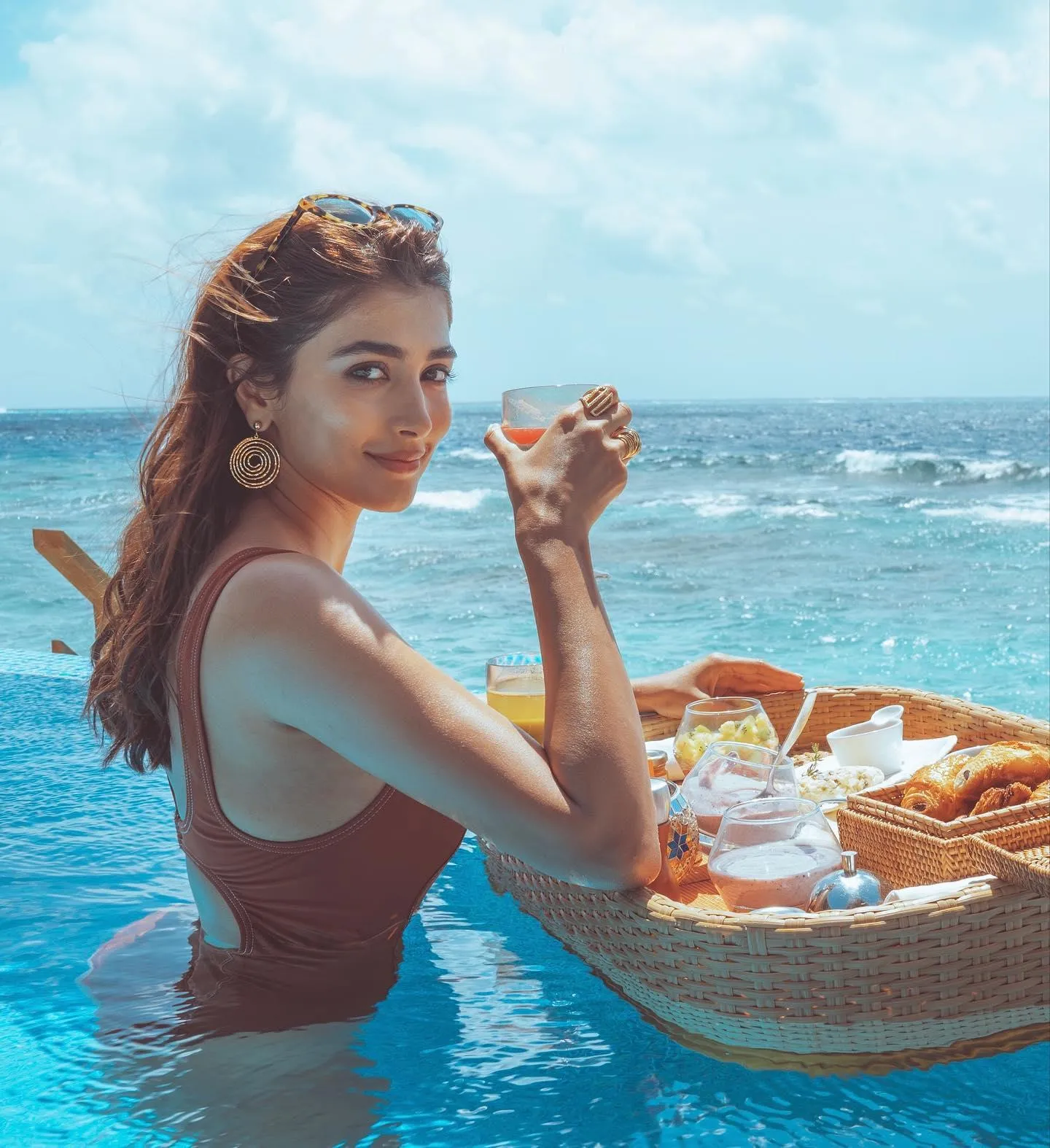 Pooja Hegde Enjoys Floating Breakfast in Ocean Pool Image