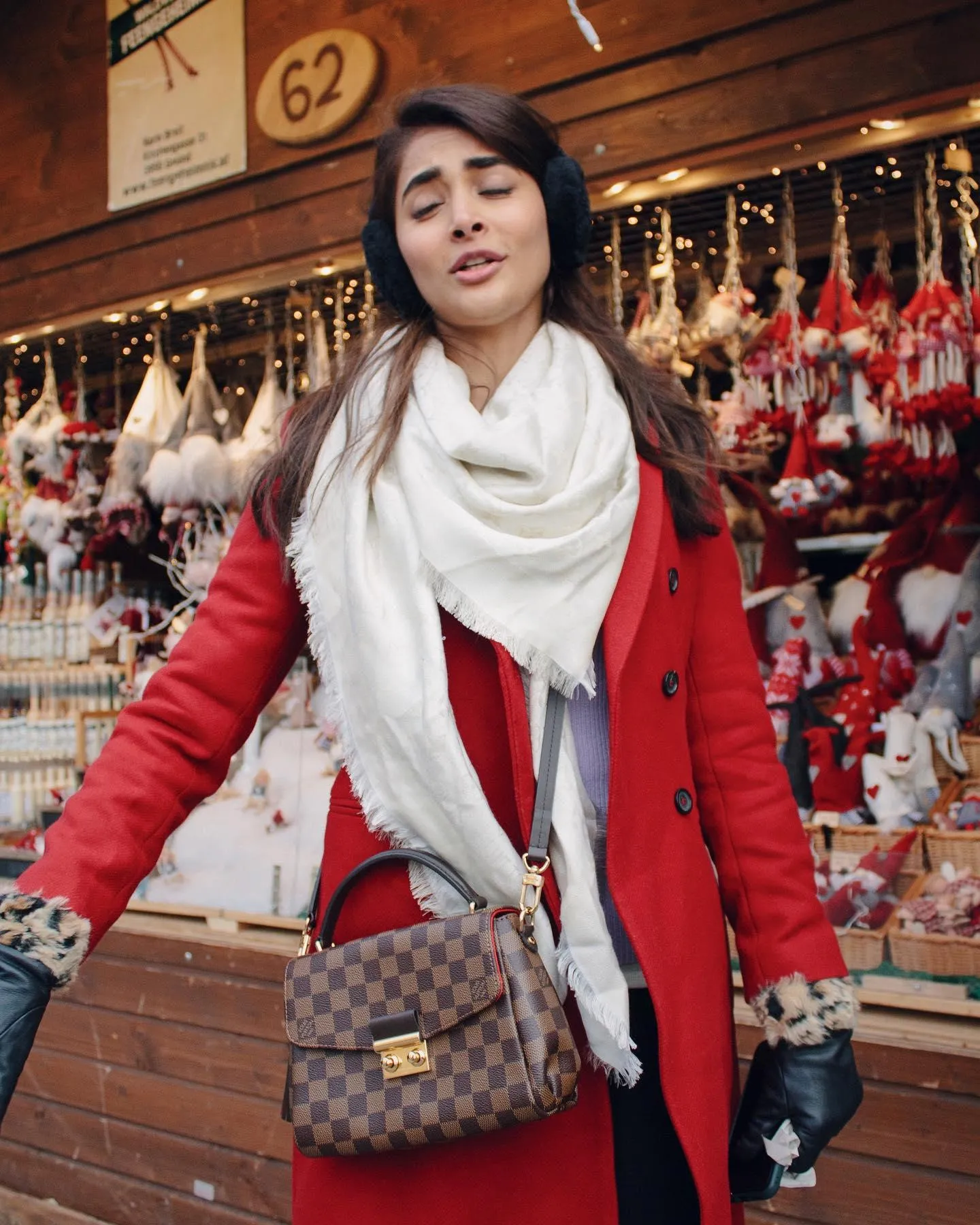 Pooja Hegde Explores a Christmas Market in Red Coat