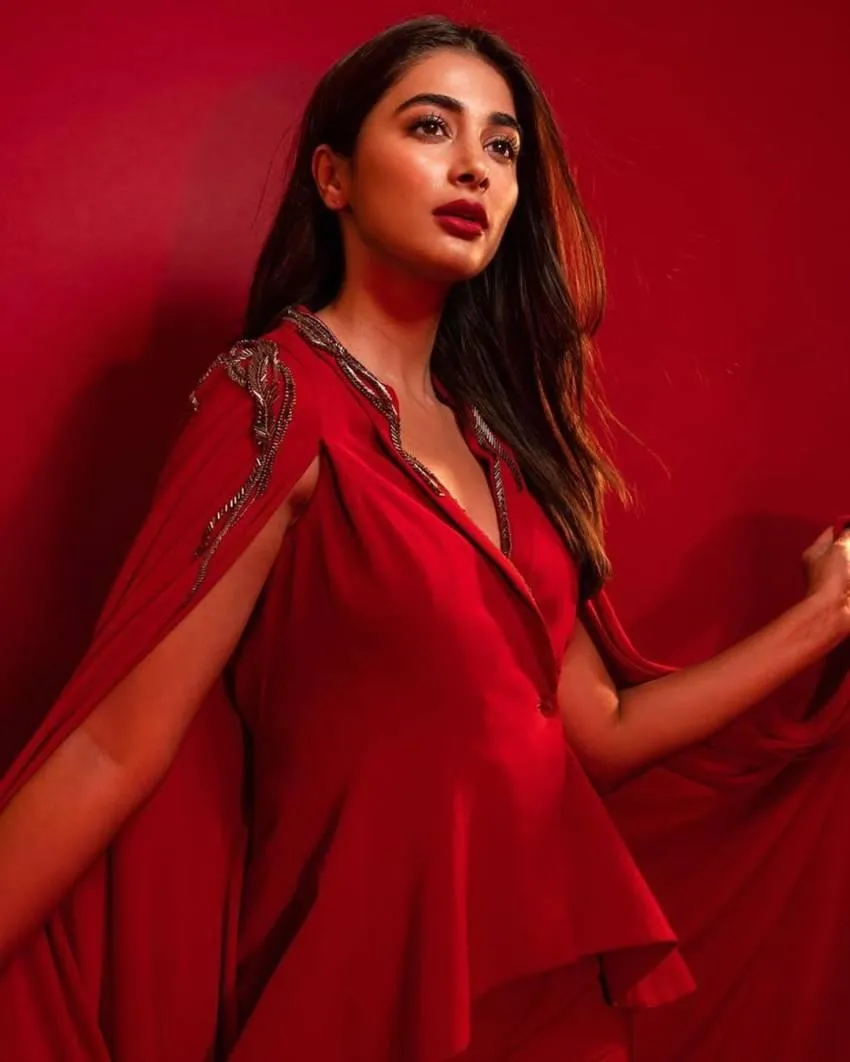 Pooja Hegde Exudes Elegance in Flowing Red Designer Dress