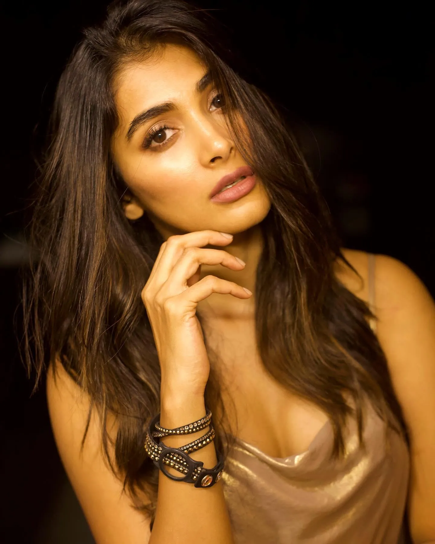 Pooja Hegde Glowing in Satin Dress with Hand Near Face