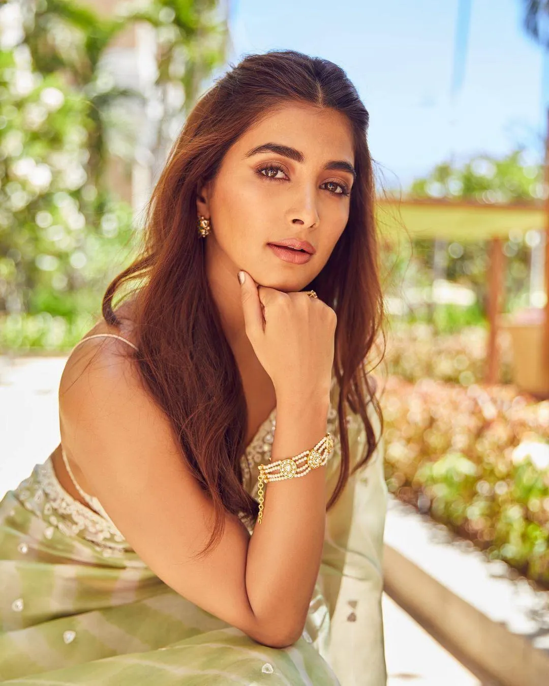 Pooja Hegde Glows in Natural Light with a Garden Setting