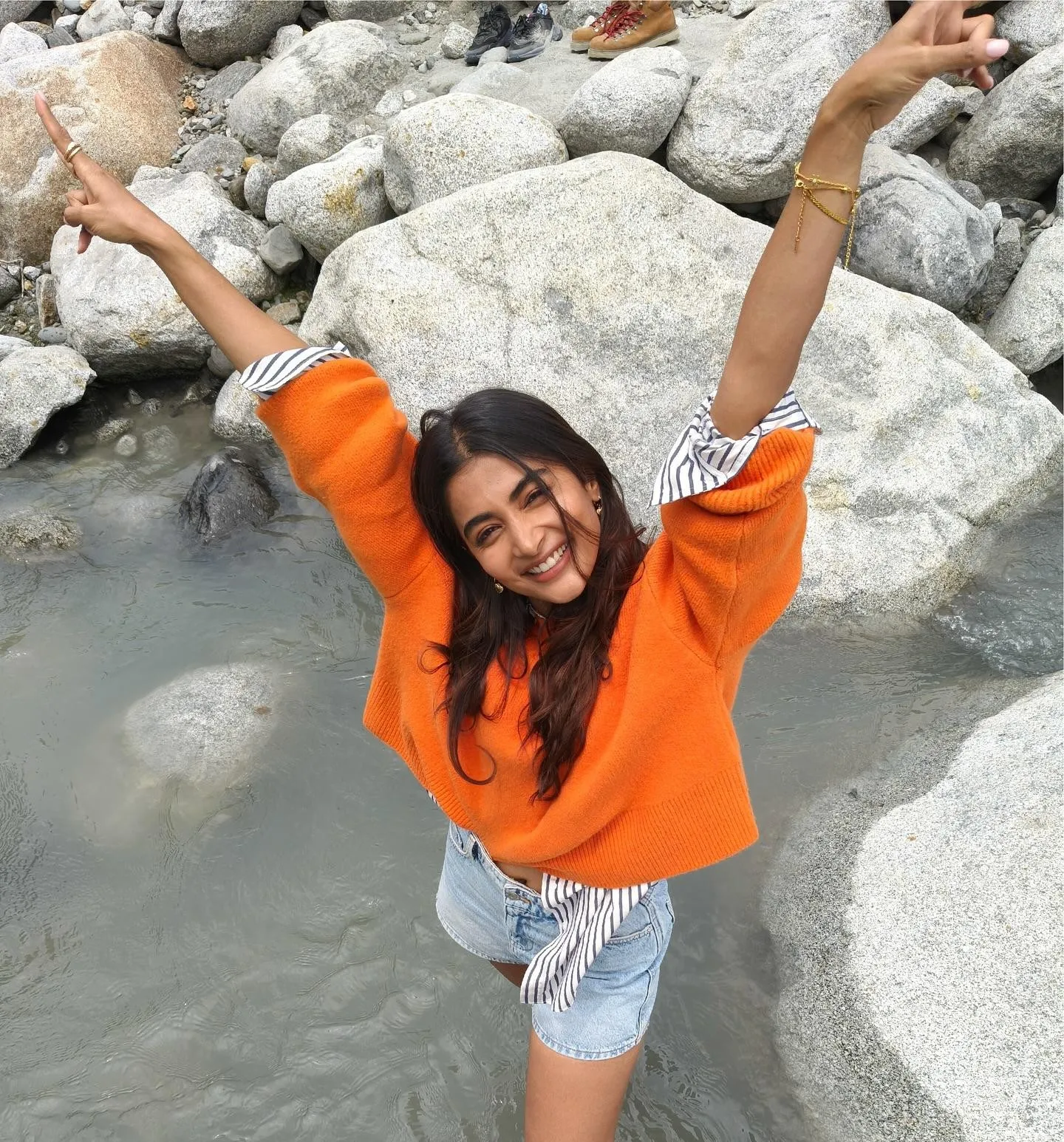 Pooja Hegde Having Fun in Stream Wearing Orange Top