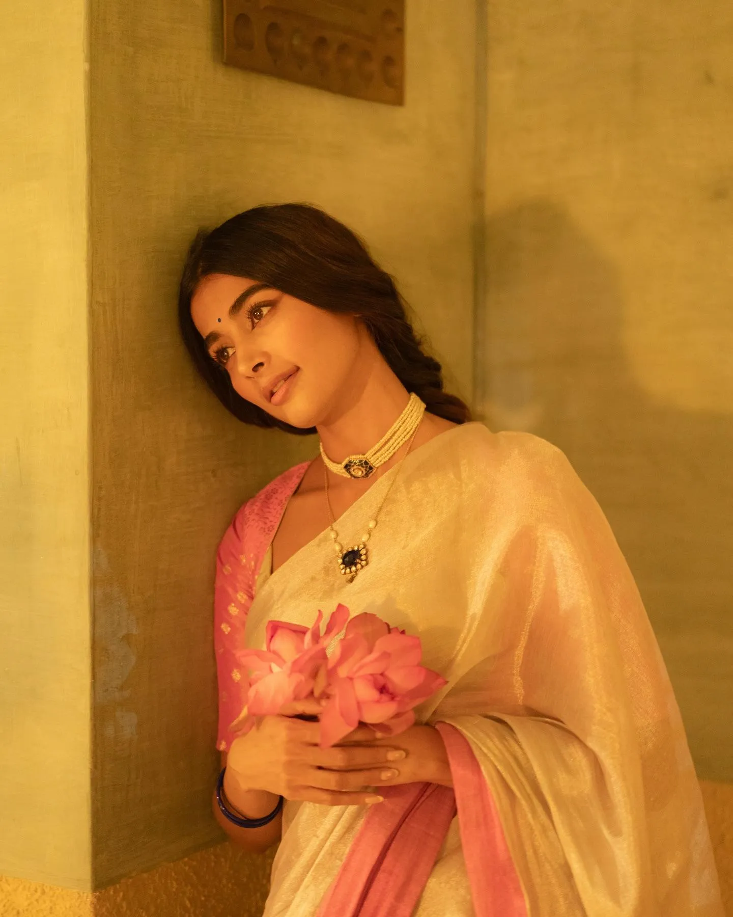 Pooja Hegde Holding Flowers Wearing Elegant Saree