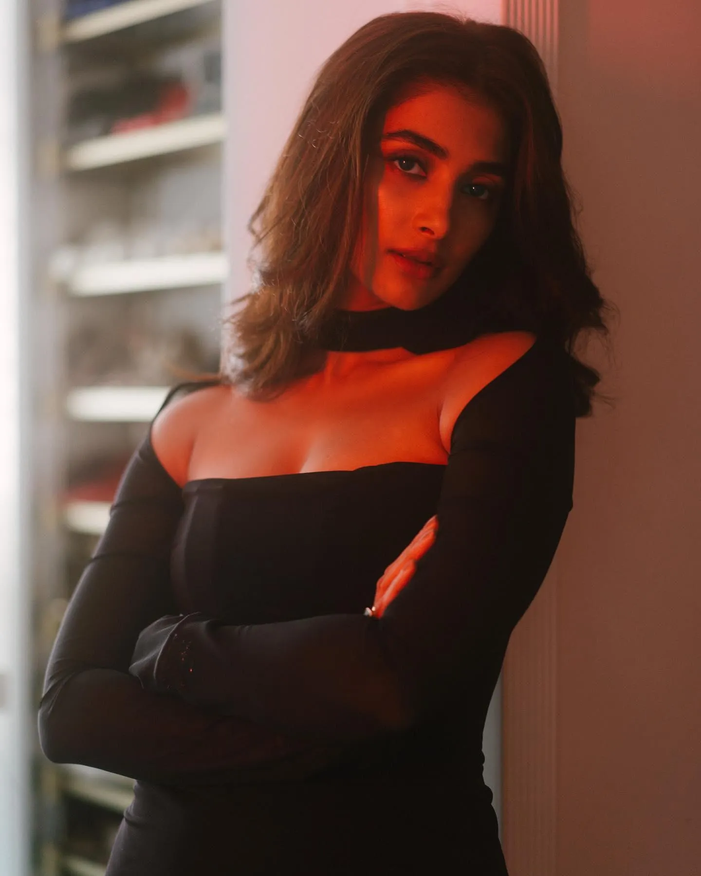 Pooja Hegde in Black Dress in Low Light Portrait Wallpaper