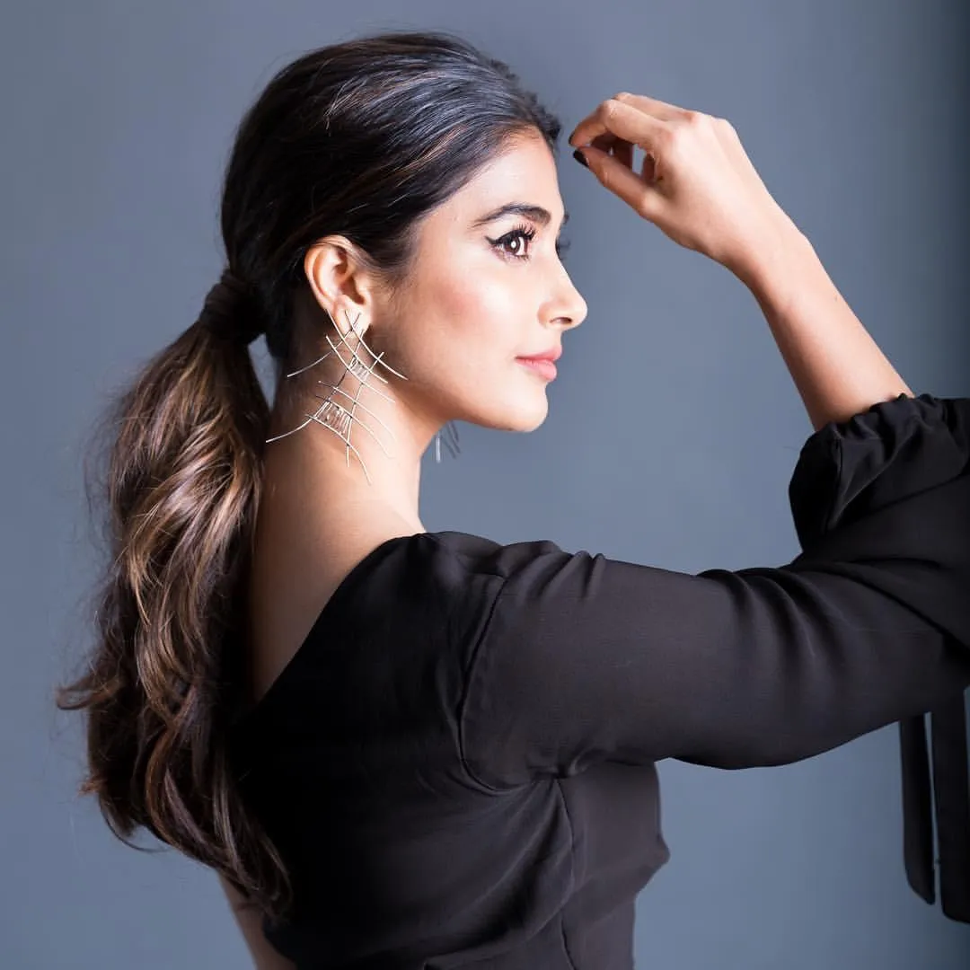 Pooja Hegde in Black Dress with Sleek Ponytail Profile