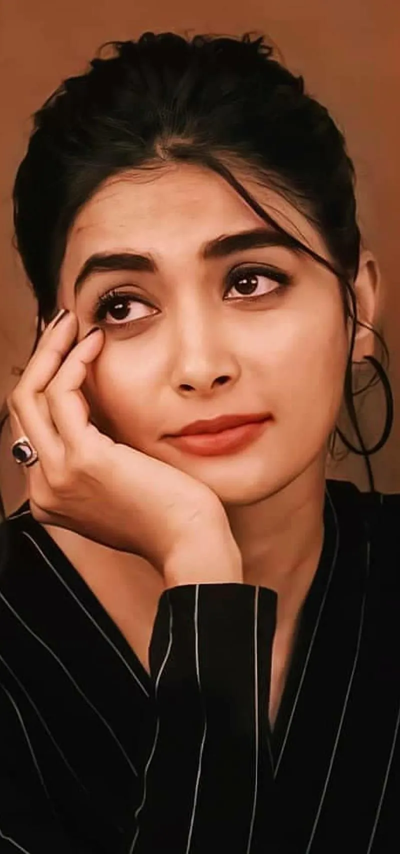 Pooja Hegde in Black Top with Bun Hairstyle and Cute Pose