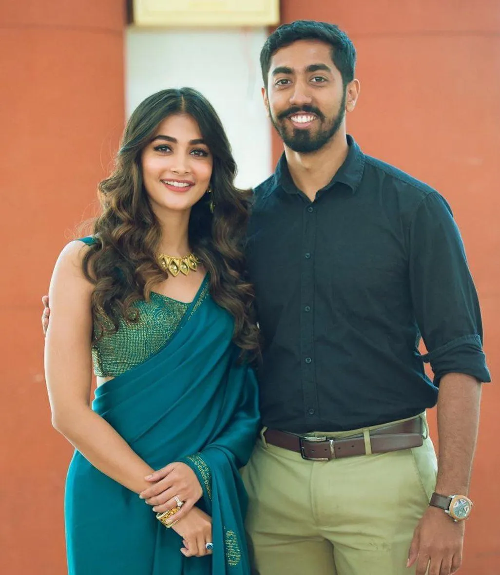 Pooja Hegde in Blue Saree Poses with Rishabh Hegde Hd