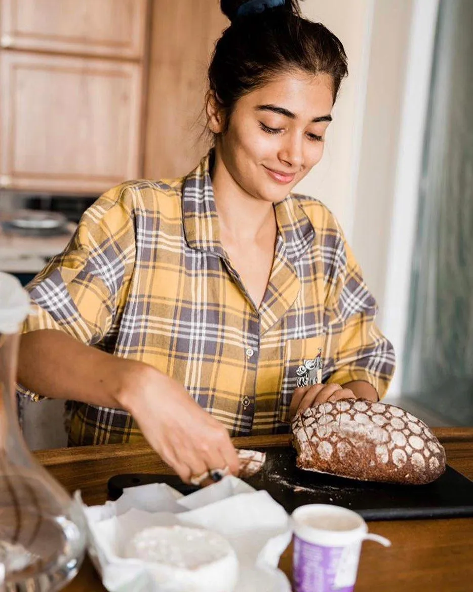 Pooja Hegde in Casual Checkered Shirt Cooking in Kitchen