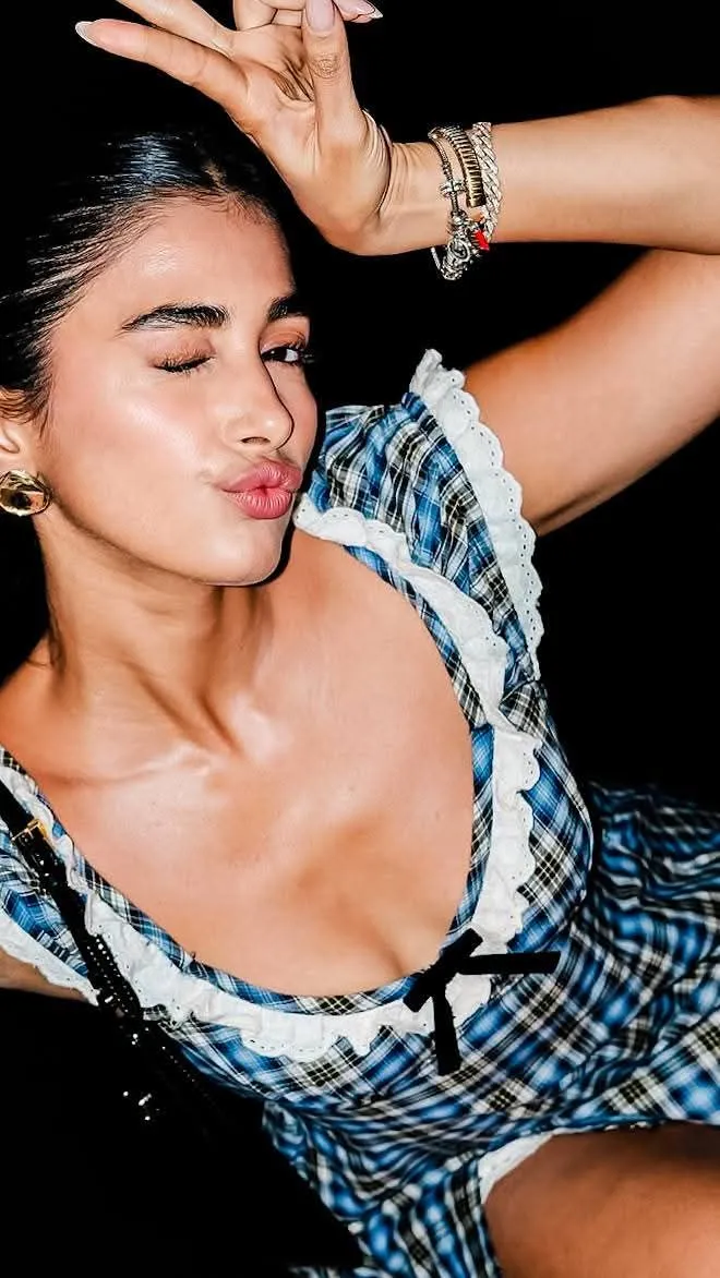 Pooja Hegde in Casual Pose Wearing Printed Party Dress