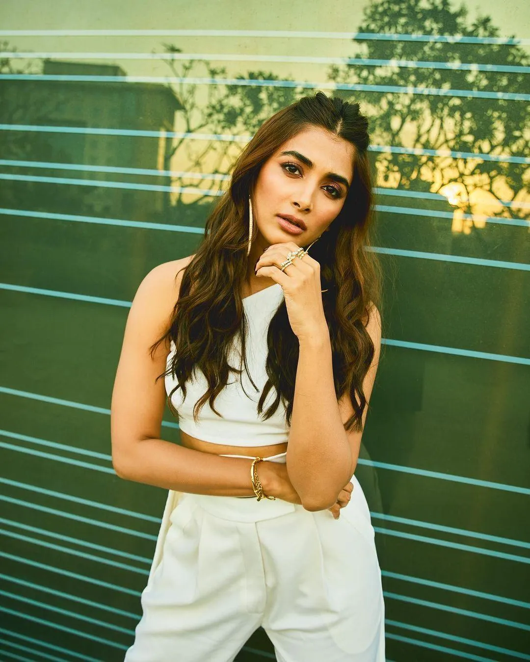 Pooja Hegde in Casual White Outfit with Green Background