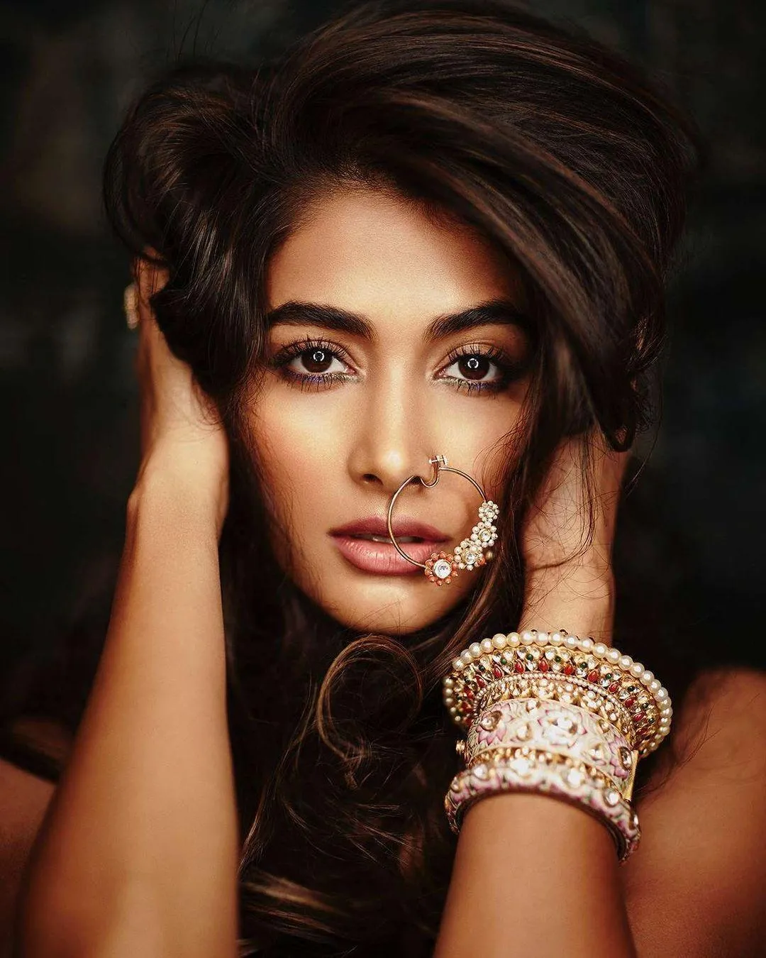 Pooja Hegde in Closeup Shot with Heavy Bangles on Hands