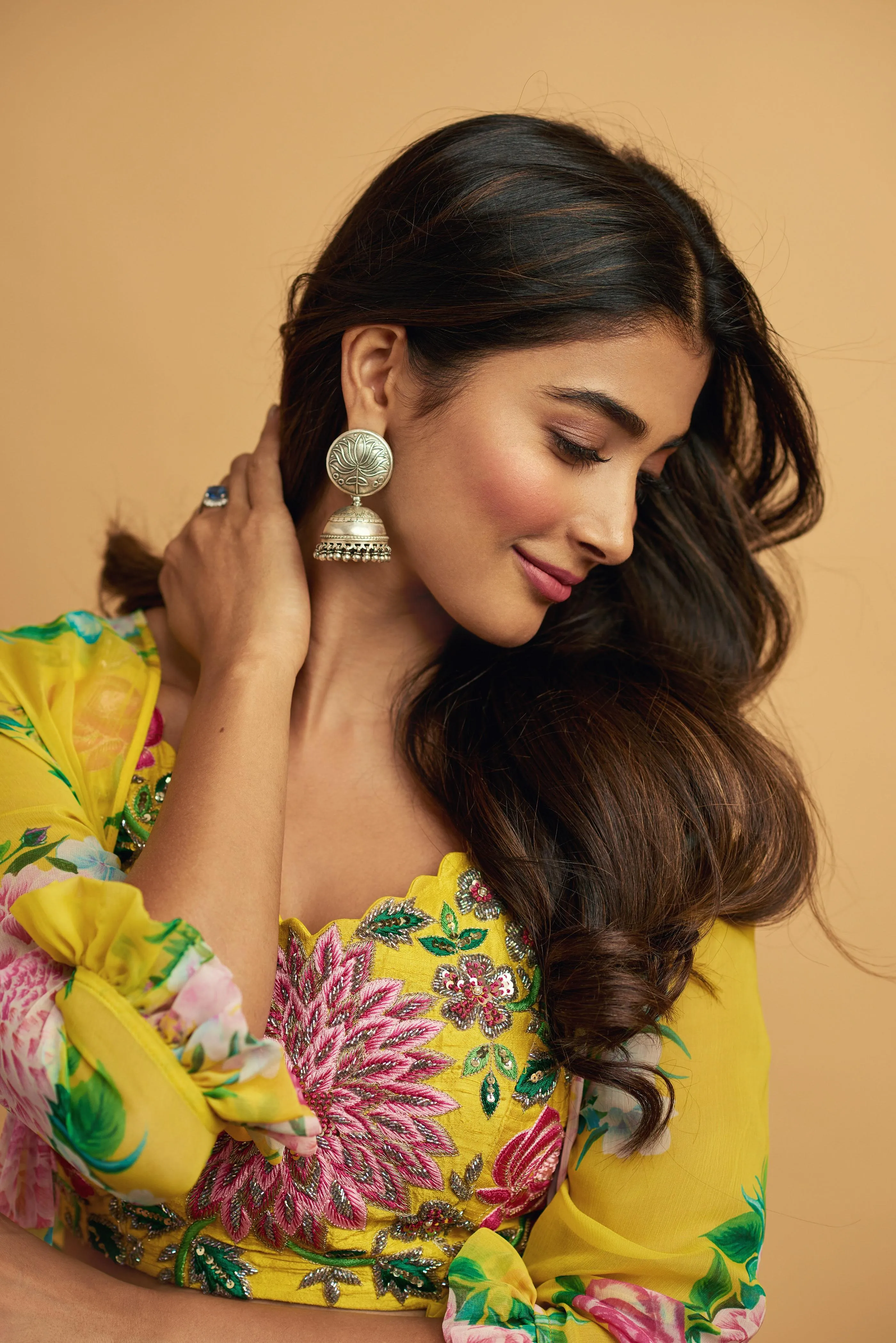 Pooja Hegde in Colorful Floral Dress with Side Profile Pose