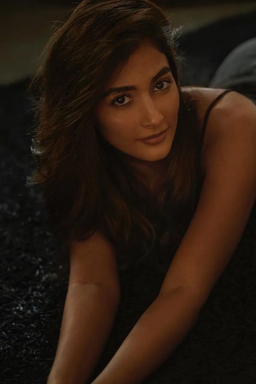 Pooja Hegde in Dim Lighting with Deep Expression in Black Dress