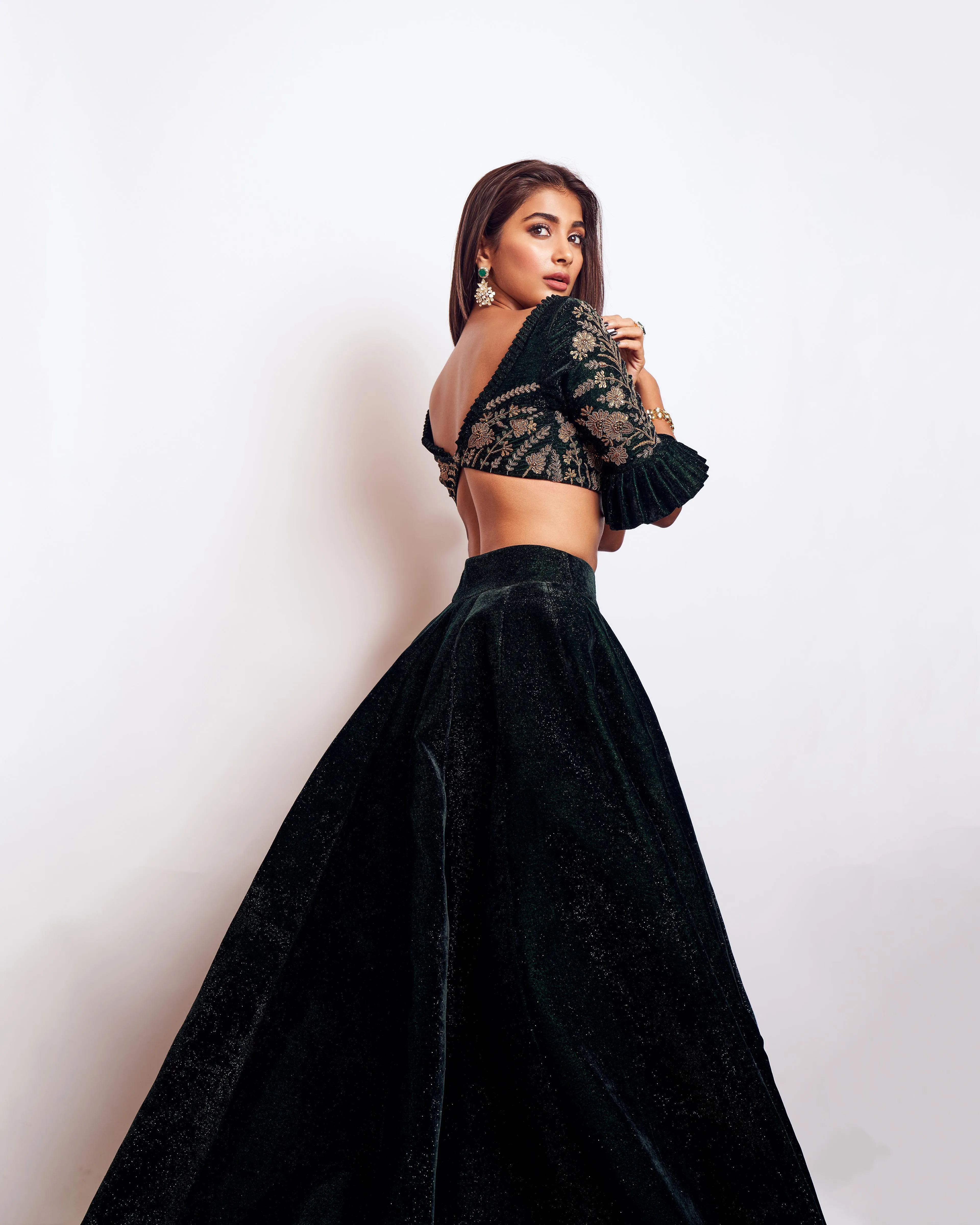 Pooja Hegde in Elegant Black Lehenga with Powerful Pose