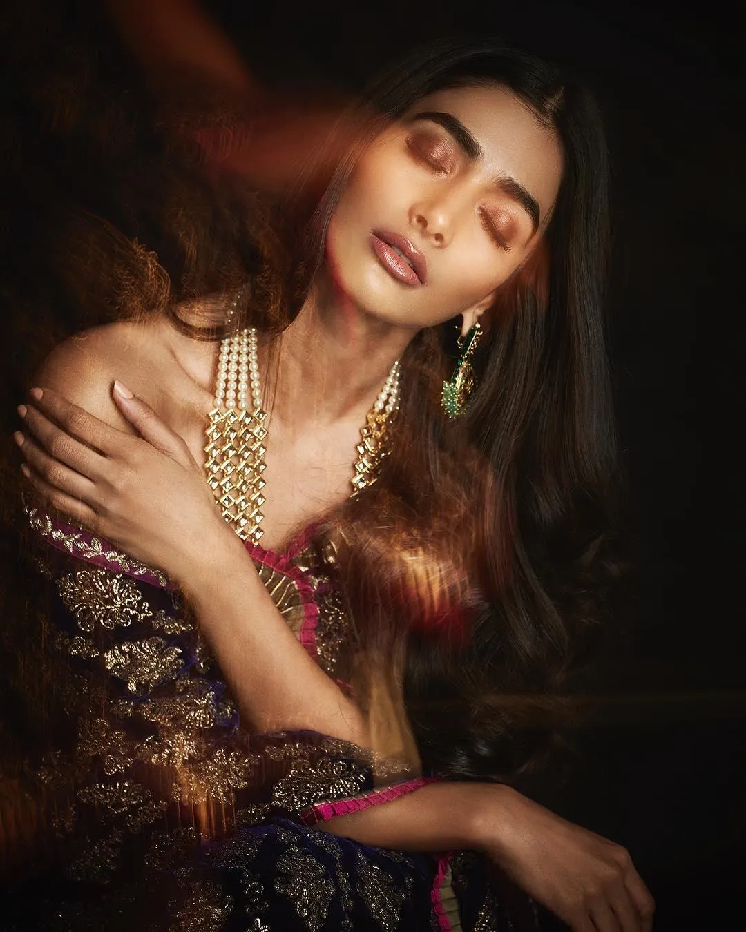 Pooja Hegde in Glamorous Attire with a Dreamy Expression