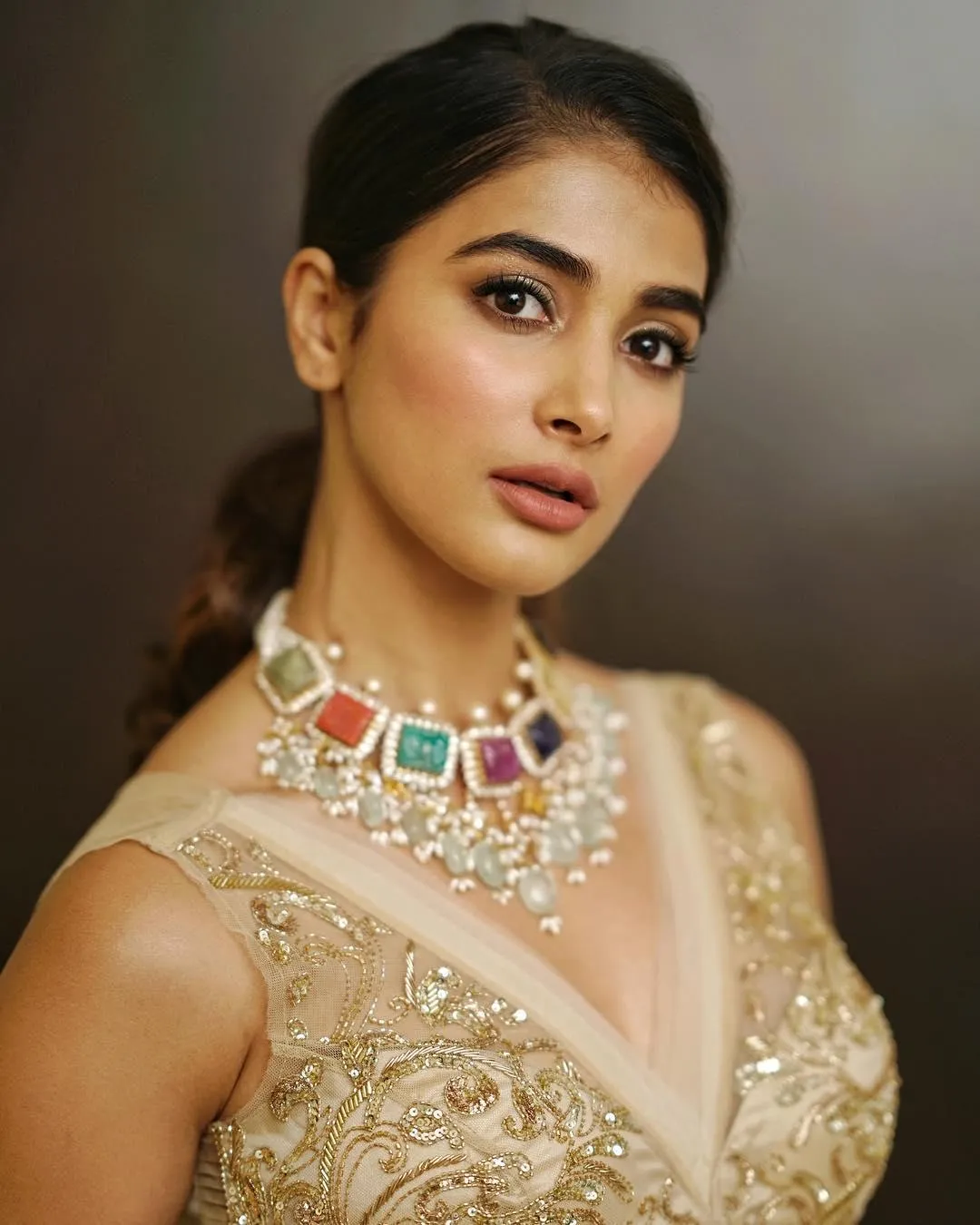 Pooja Hegde in Gold Embellished Gown with Necklace