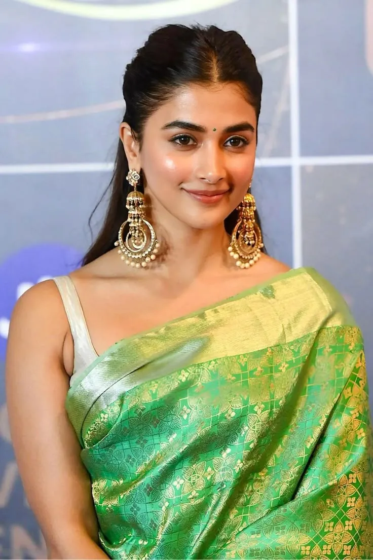 Pooja Hegde in Green Saree Wearing Traditional Jewelry
