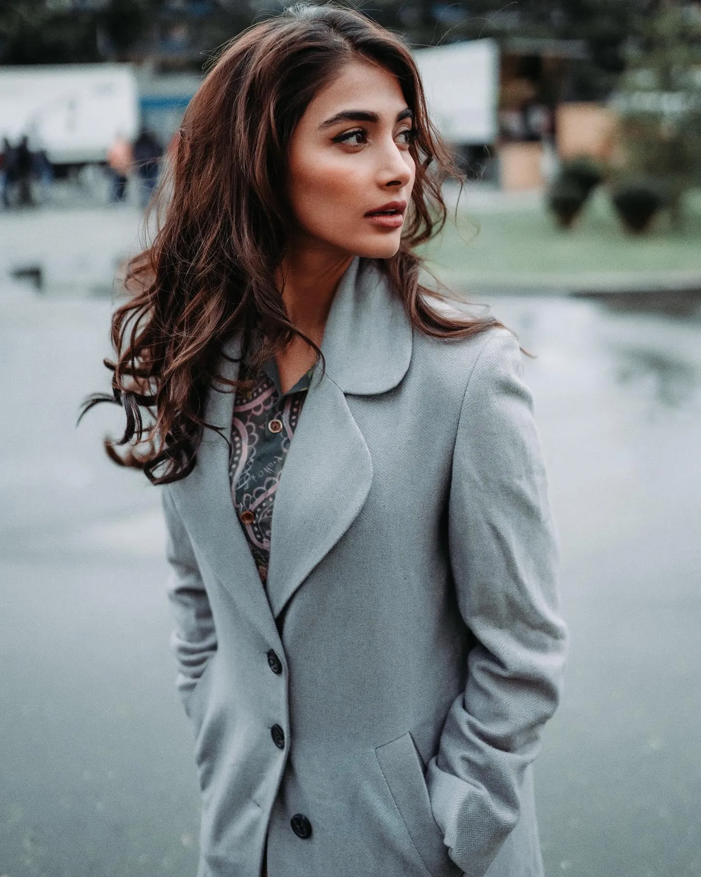 Pooja Hegde in Grey Coat Standing Near Foggy Lake Wallpaper