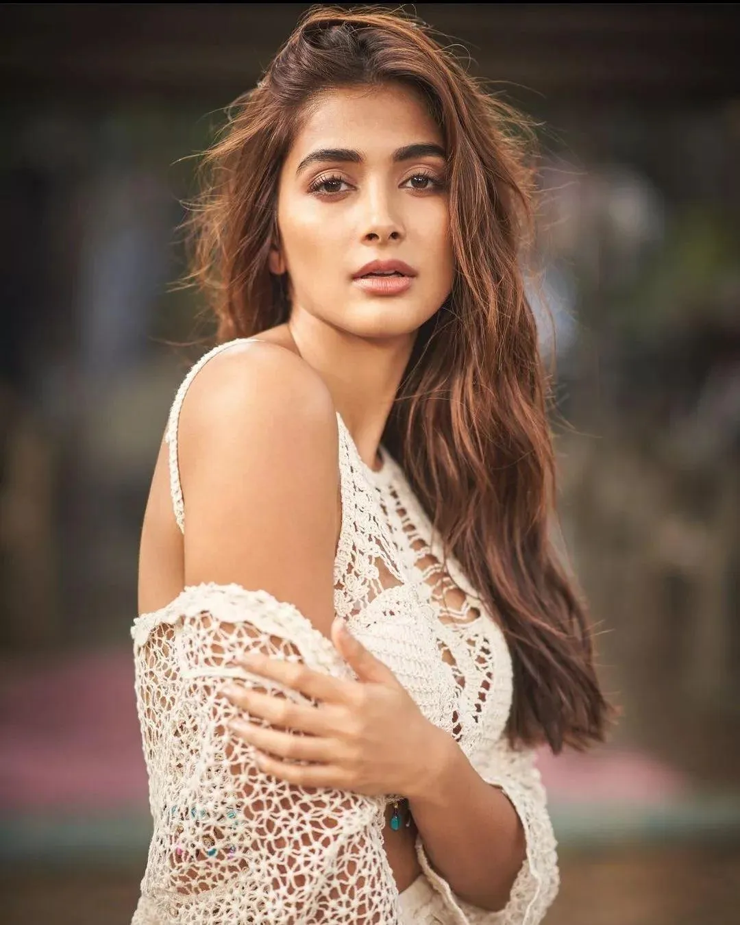 Pooja Hegde in Lace Outfit with Moody Background Wallpaper