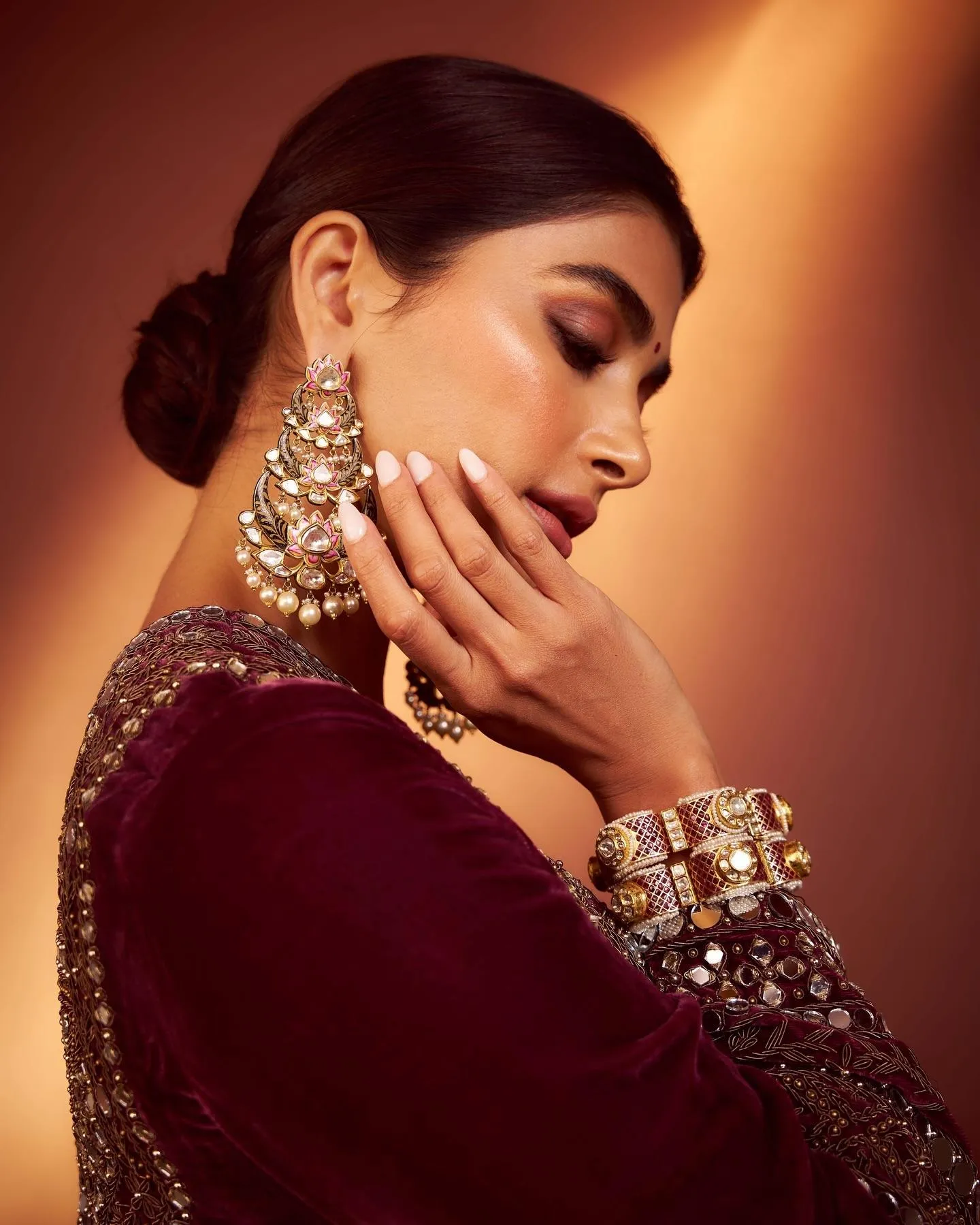 Pooja Hegde in Maroon Traditional Dress with Earrings