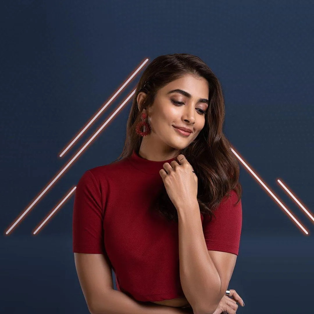 Pooja Hegde in Modern Red Top with Creative Background