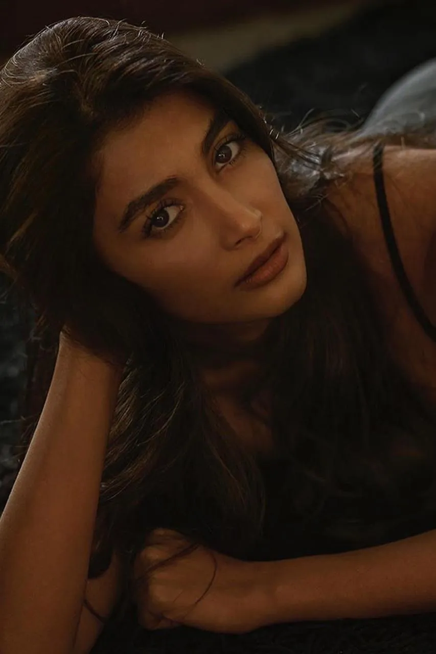 Pooja Hegde in Natural Pose Wearing Black Dress with Soft Light