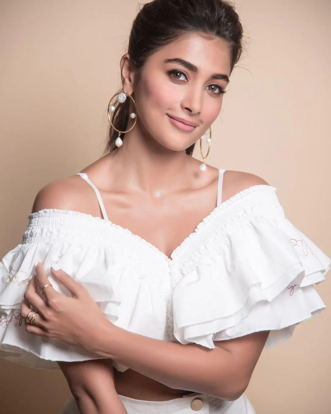 Pooja Hegde in Off Shoulder White Top and Casual Style