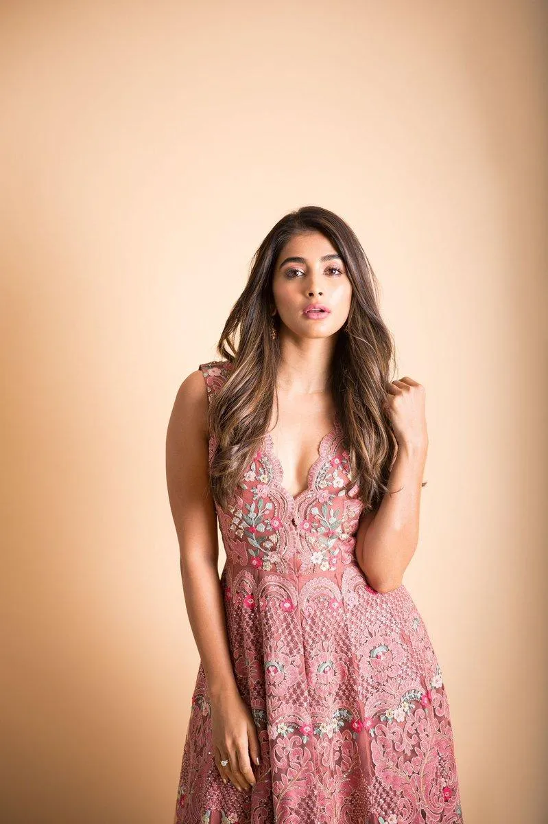 Pooja Hegde in Pink Floral Dress Standing Gracefully