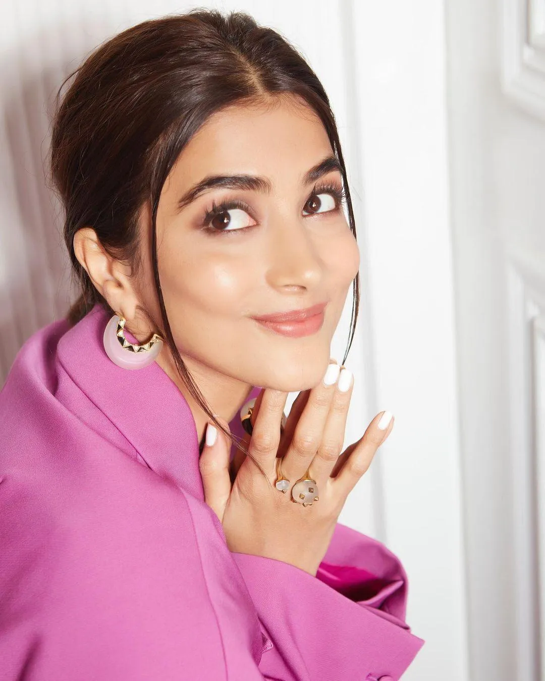 Pooja Hegde in Pink Outfit with a Charming Smile Pose
