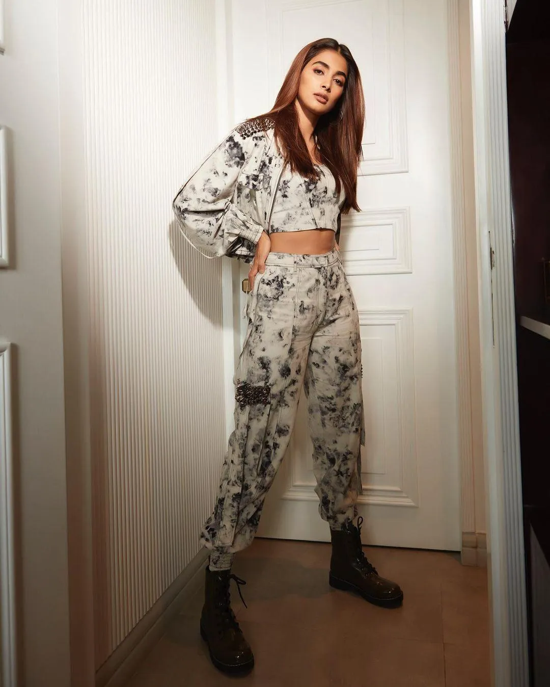Pooja Hegde in Printed Outfit Posing in Hallway Look