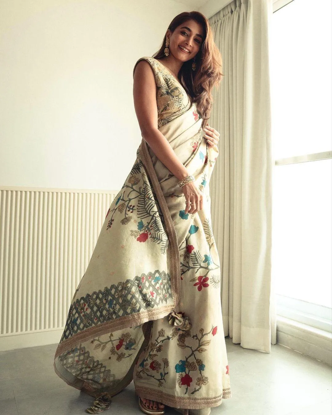 Pooja Hegde in Printed Saree with Hands Folded Posing