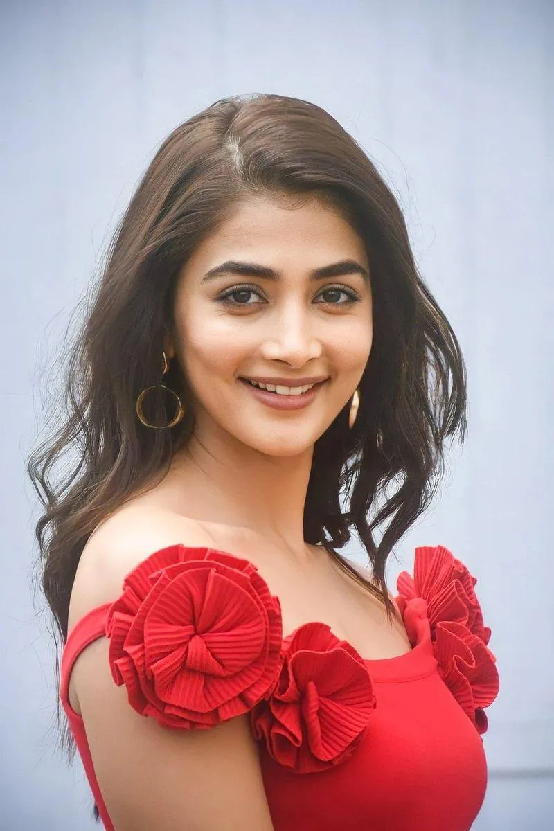 Pooja Hegde in Red Floral Dress with Joyful Expression