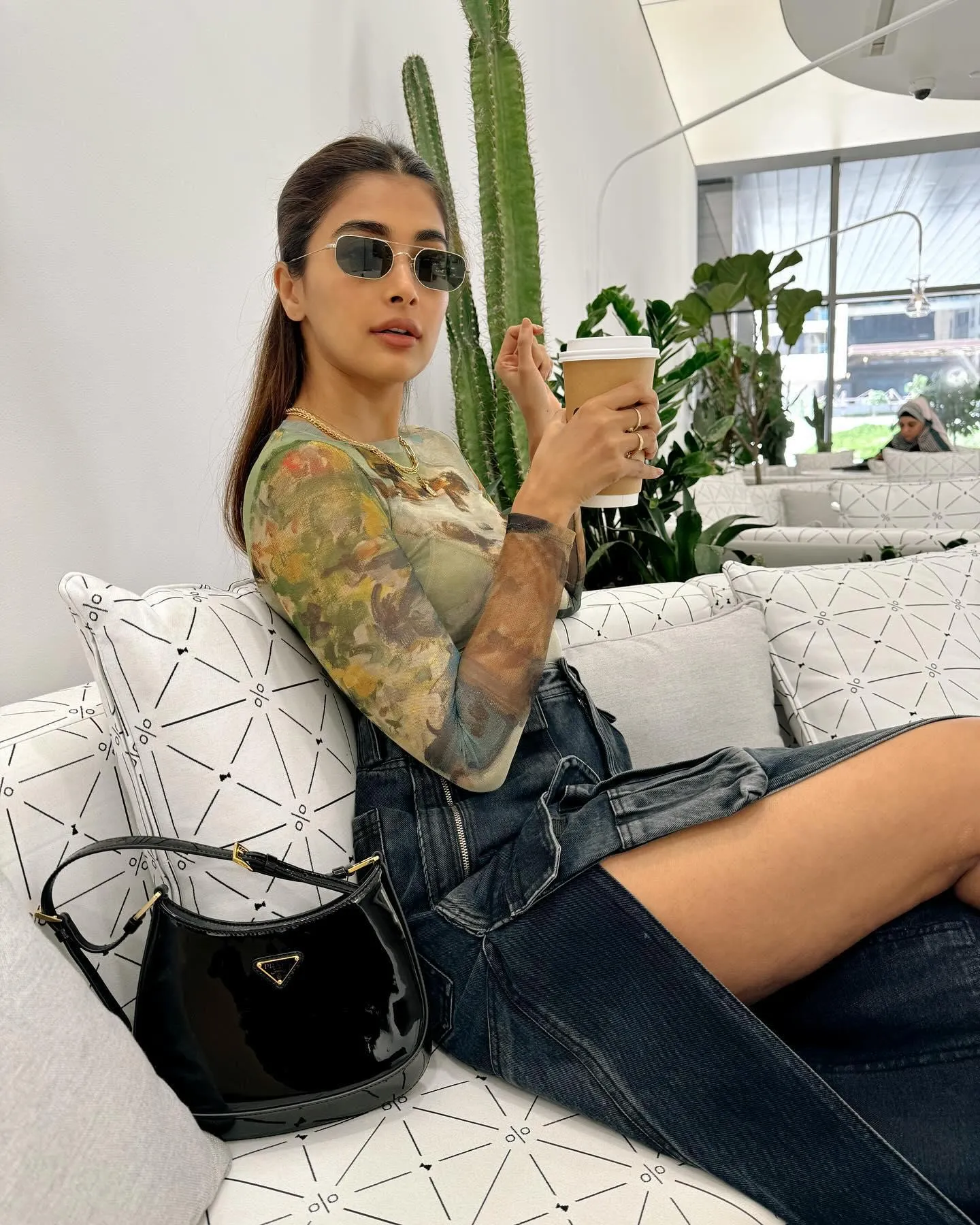 Pooja Hegde in Sheer Green Top and Denim Shorts Wallpaper