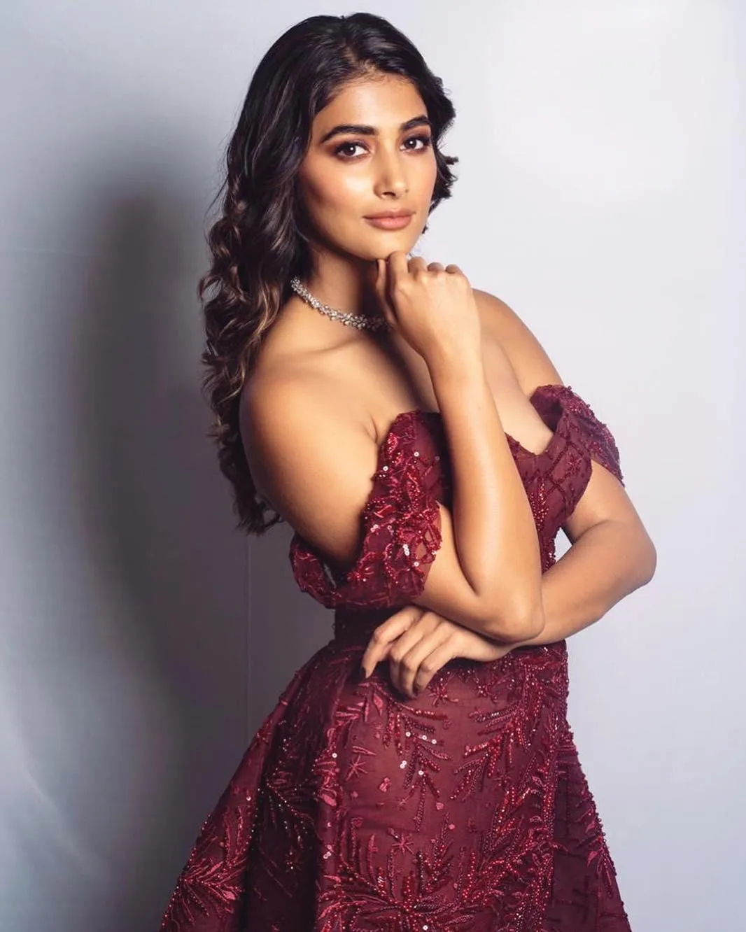 Pooja Hegde in Stunning Maroon Dress Poses Elegantly