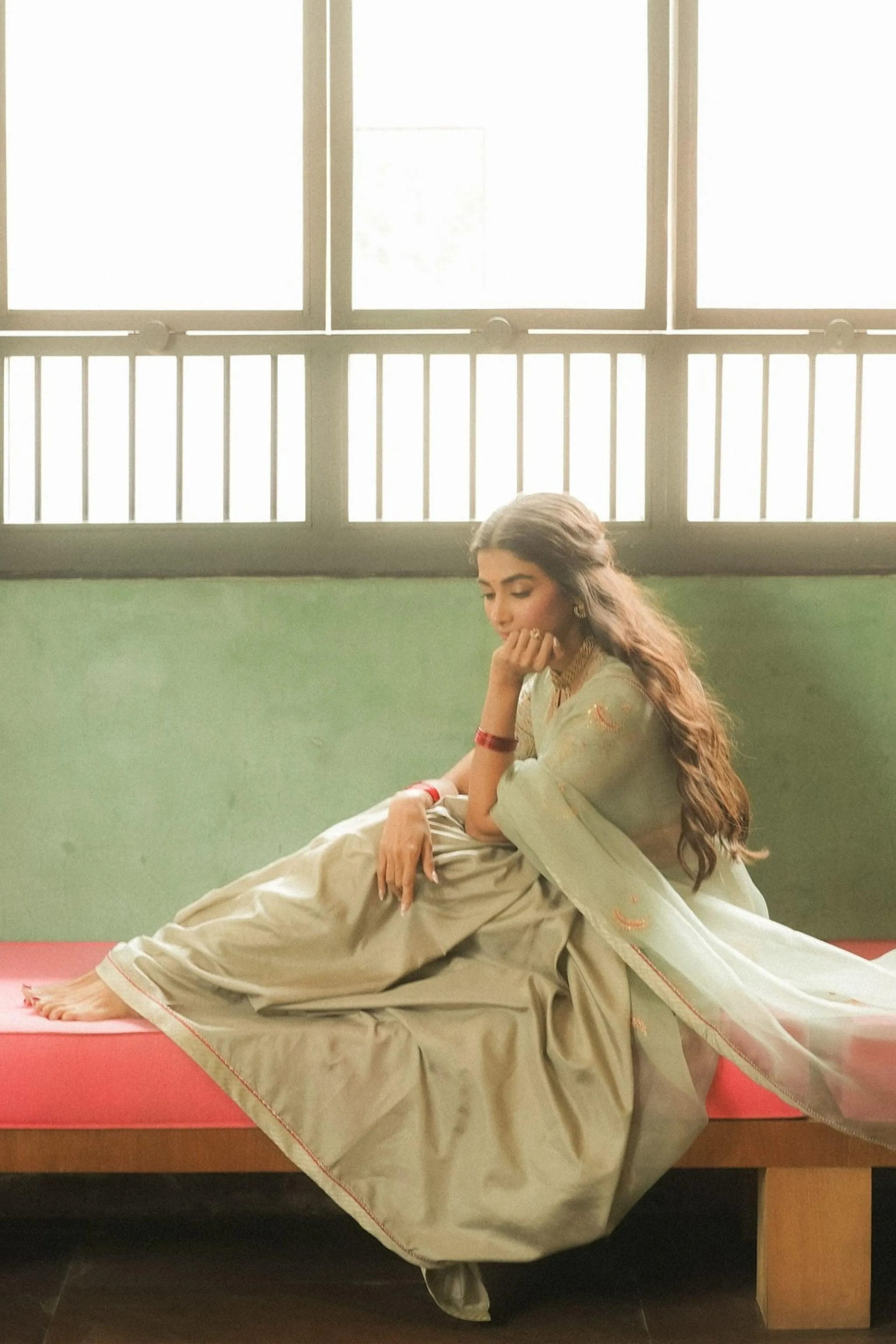 Pooja Hegde in Vintage Gown Near Soft Window Light Image