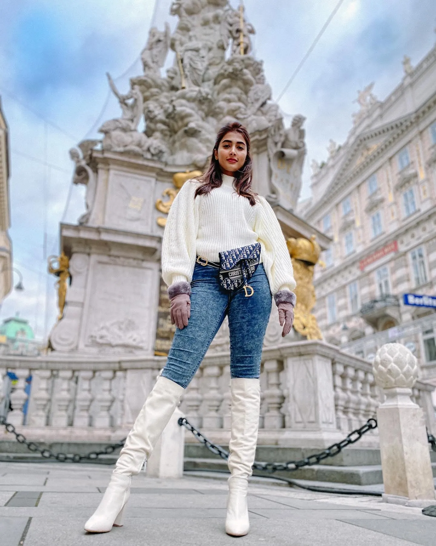 Pooja Hegde in White Boots Posing At a Historic Monument