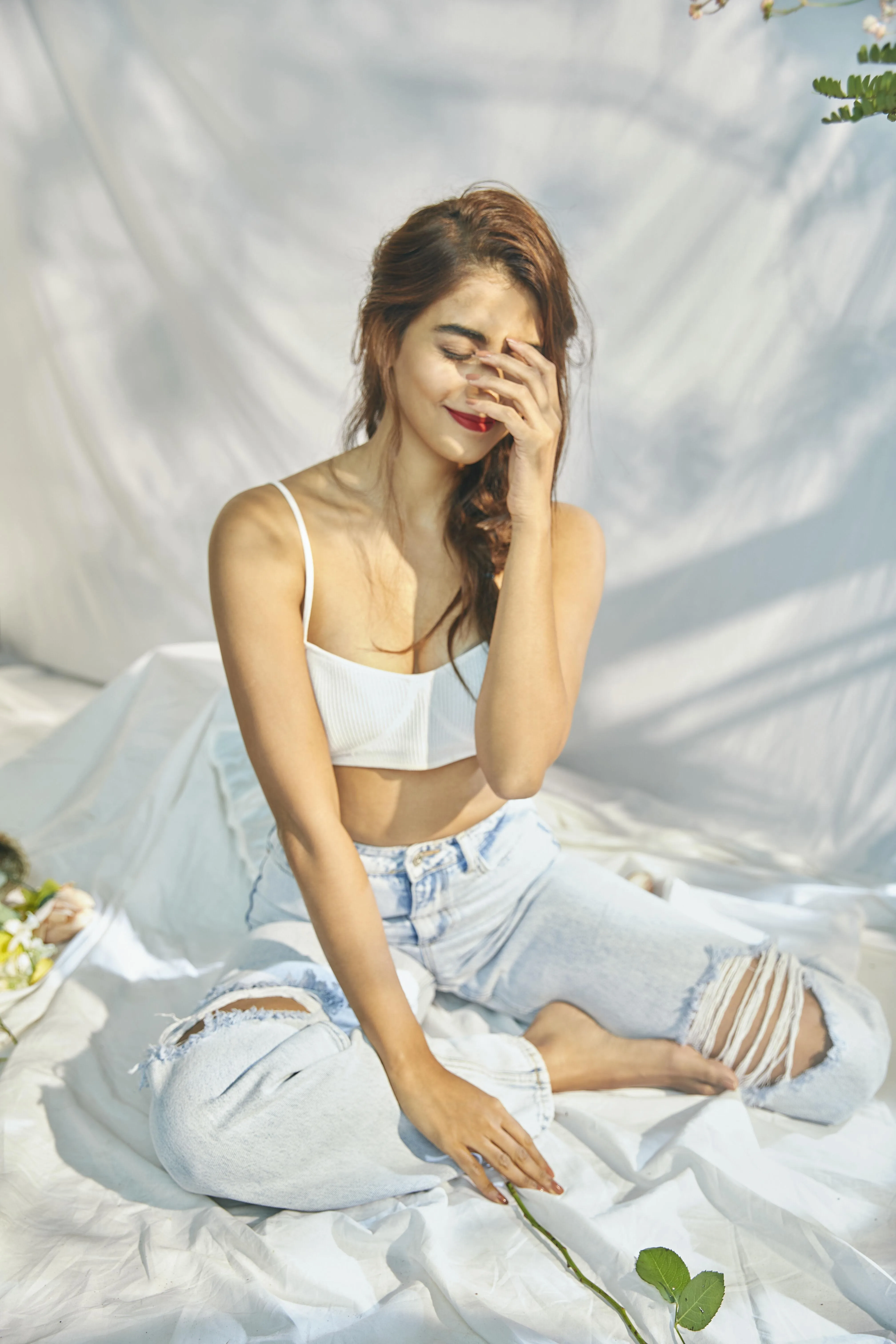 Pooja Hegde in White Top Smiling Under Natural Sunlight